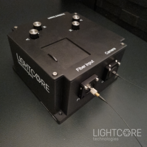 User-friendly injection box for delivery of tabletop laser via an optical fiber